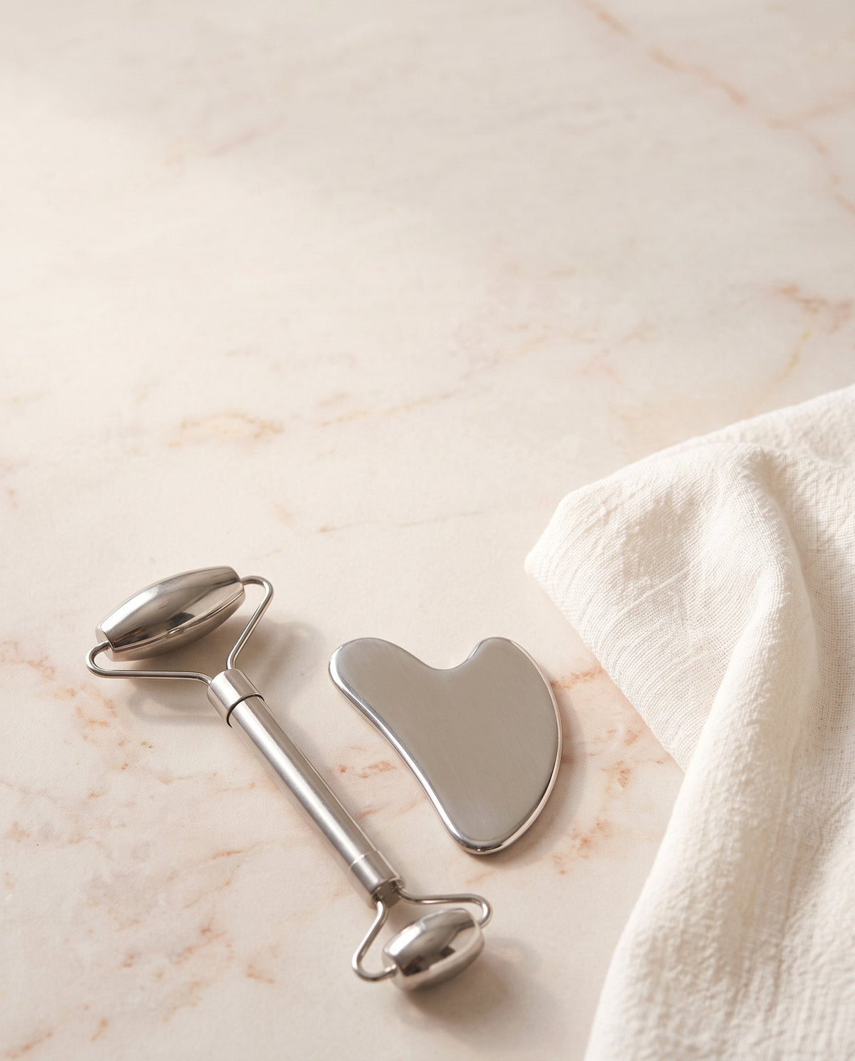 Face tools: stainless steel face roller and gua sha
